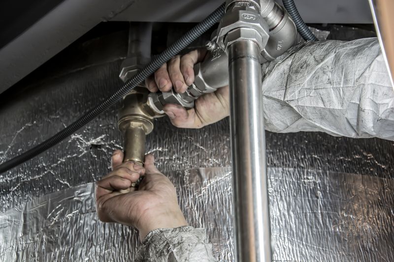 Representative photo: plumbing work in progress, identity protected
