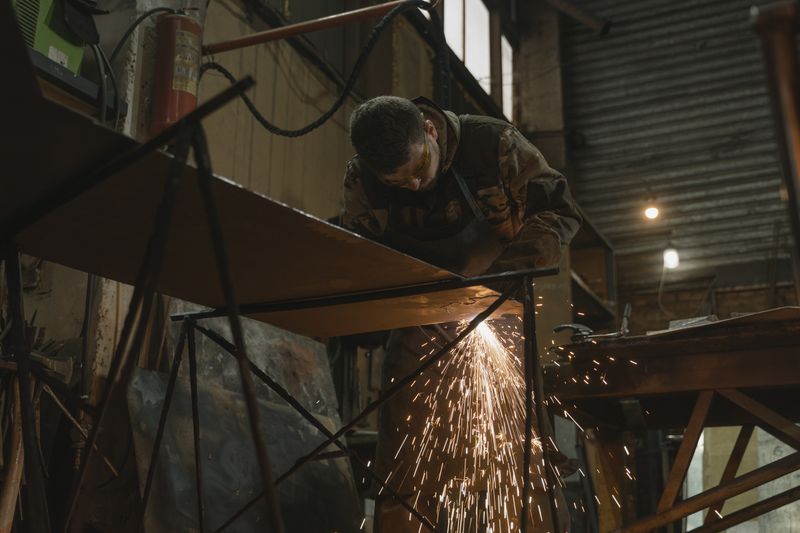 Representative photo: metal workshop in operation, identity protected